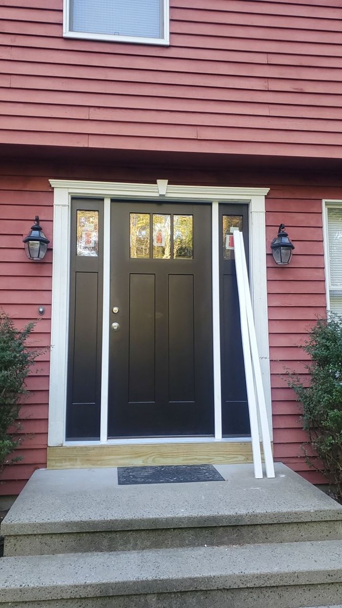 Rhode Island front door installed with sidelight panels